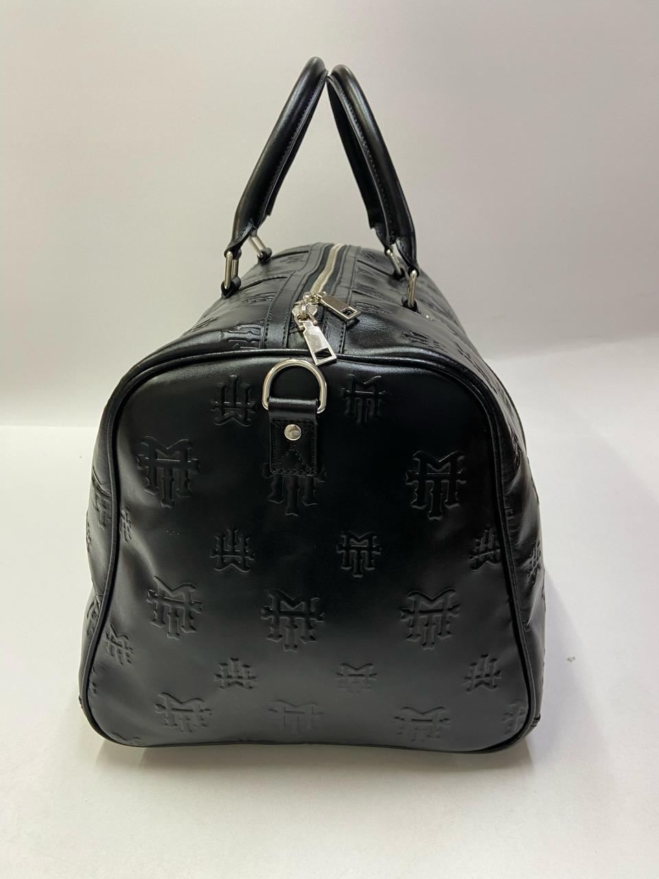 Mitten Ties official leather carry-on bag